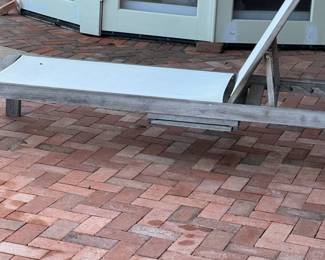 Pair of teak chaise lounges