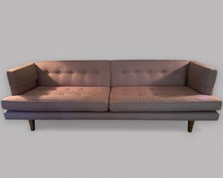 Mid Century Modern Sofa In The Style Of Edward Wormley For Dunbar, upholstered in grey fabric, H: 27 inches x w: 87 inches x d: 30 inches