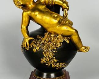 Louis XVI Style Patinated Bronze And Ormolu Vase. H: 7 x w: 3 1/2 x d: 3 1/2 inches
CONDITION: some scuffs to base