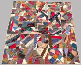 Antique American Crazy Quilt, C. 1890. 73 x 74 inches
CONDITION: wear to silk and velvet panels, a few areas where stitching is coming up