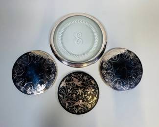 Collection Of Silverplate Trivets (4), various sizes and styles, smallest, dia: 6 inches; largest, dia: 9 inches