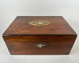 Victorian Tunbridge Ware And Burl Wood Writing Slope, Mid 19th Century, inlaid with mother of pearl and abalone shell, the interior with a violet slope, outlined in gilt embossed leather, for writing and space for pens and ink, H: 6 inches x w: 13 1/2 inches x d: 9 1/4 inches
CONDITION: corner with losses to veneer, splitting to back, underside felt heavily worn; only one bottle present