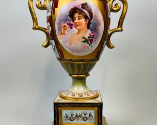 Continental Porcelain Covered Urn With Oval Portrait Cartouche, On Stand. H: 22 1/2 x w: 11 inches