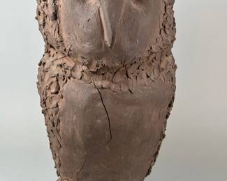 Large Hand Formed Clay Owl. H: 15 1/2 x w: 7 x d: 8 inches
Condition: Firing crack