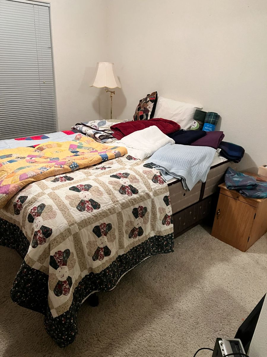 Full size bed and some beautiful quilts, blankets, vintage floor lamp