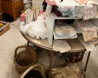 baskets, stitched hankies, one of the baby dresses and more