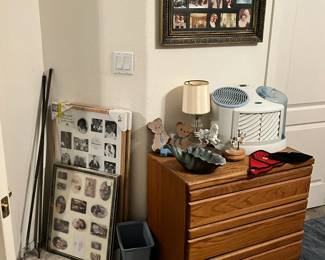 dresser and frames that are large and never been opened, large frame on wall, humidifier, lamp, musical horse carousels and more