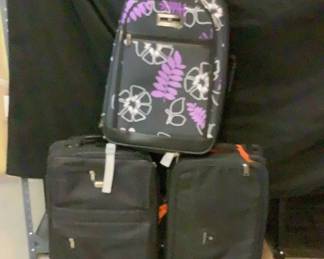 Three Small Suitcases