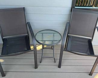 Two Chairs and a Round Table