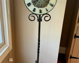 Wrought iron pole clock