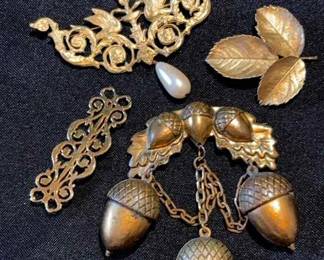 4 Golden Colored Brooches