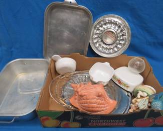 Lot 343. Housewares including cake pans, a Bundt pan, decorative items, and more