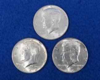 Lot 131. Three 1964 Kennedy half dollars