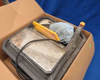 Lot 116. Benchtop 7" wet tile saw, untested