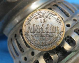 Lot 316. Lighting components including a Model 12 Aladdin. For parts or repair.