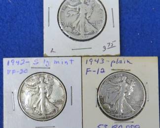 Lot 132. Three Walking Liberty half dollars