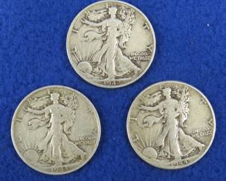 Lot 227. Three Walking Liberty half dollars