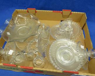 Lot 352. Vintage glassware, including candle holders, amber colored depression glass, and more