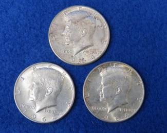 Lot 222. Three 1964 Kennedy half dollars