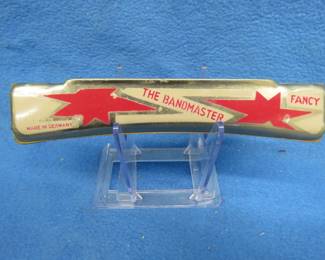 Lot 34. Seydel Fancy Bandmaster 48-hole Tremolo enameled harmonica in the key of G. Sounds great, box in VGC