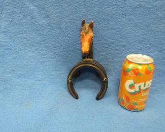 Lot 346. Cast iron horse decorative item for hanging reins or other tack