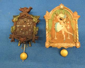 Lot 184. Two vintage clocks for parts or repair. Includes a risque "Fan Dance" clock.