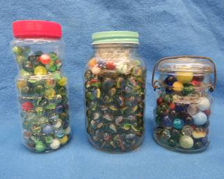 Lot 137. Three jars of marbles