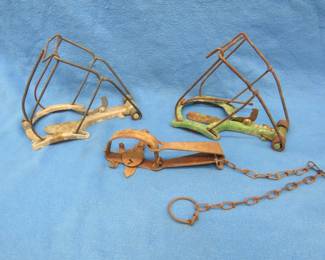 Lot 290. Two mole traps and a vintage leghold trap
