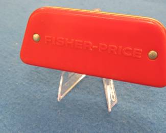 Lot 301. Fisher-Price toy harmonica, made in Brazil