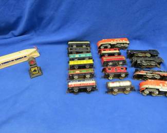 Lot 85. Vintage metal wind-up trains including a Lionel Zepplin