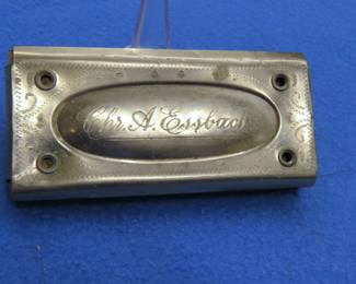 Lot 298. Essbach-Weiner Oktav Wender Orchester double-sided harmonica. Some holes have no sound.