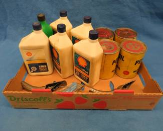 Lot 292. Ten quarts of 20/20 oil in paper cans and 10/30 oil in plastic containers and spouts