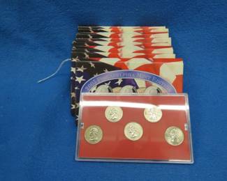 Lot 44. Four different 2003 state quarter sets