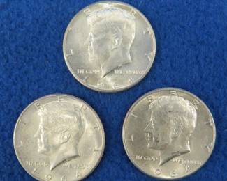 Lot 306. Three 1964 Kennedy half dollars