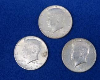 Lot 129. Three 1964 Kennedy half dollars