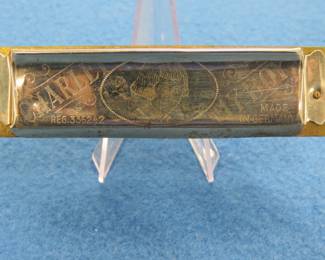 Lot 296. Fisher 10-hole diatonic Charley My Boy harmonica