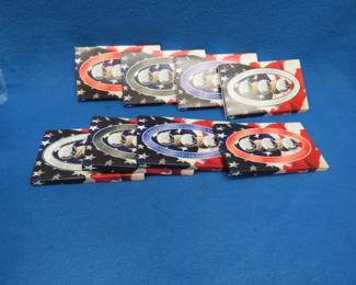 Lot 47. Four 2001 and four 2002 state quarter sets. Each has 5 quarters. 40 total.