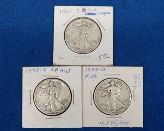 Lot 130. Three Walking Liberty half dollars
