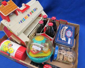 Lot 114. Old Coke bottles, Fisher-Price toy, Dominos, and more