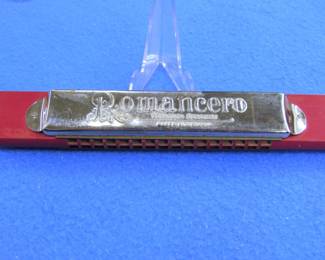 Lot 299. Fischer 6 1/2" Romancero harmonica in the key of D.