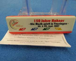 Lot 161. Hohner 150 years 1857-2007 toy plastic harmonica