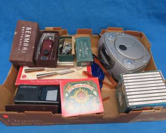 Lot 191. Large blue ocean life-themed serving platter, Sony Watchman, old sewing items, and more