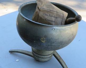 Lot 169. Vintage cream separator parts with original paperwork and bowl rings