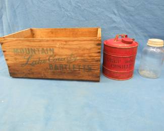 Lot 273. Vintage wooden box, gas can, and an old Hormel jarV
