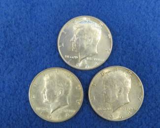 Lot 308. Three 1964 Kennedy half dollars