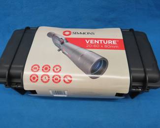 Lot 250. NIP Simmons Venture Spotting scope with tripod and hard case.
