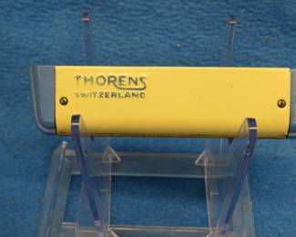 Lot 31. Thoren's 63 diatonic enameled harmonica in the key of C. Sounds great