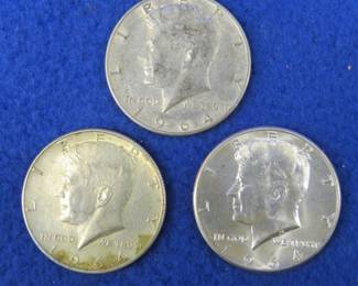 Lot 305. Three 1964 Kennedy half dollars