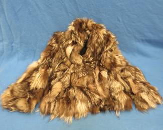Lot 318. Women's fur coat in good condition. Mandel's Designer Series. Appears to be small/medium.