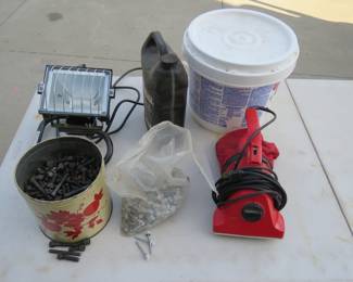 Lot 104. Box lot including hardware fasteners, vacuum, shop light and more.